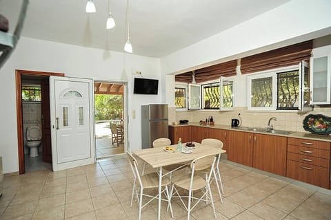 Our fully equipped kitchen area, complete with ample counters for seamless meal preparation.