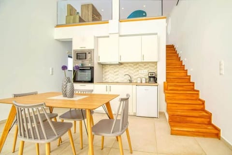 Experience the ultimate in calmness and comfort! Our cozy, pastel-colored maisonette boasts a fully-equipped kitchen and a stylish dining table, creating the perfect retreat for your relaxation