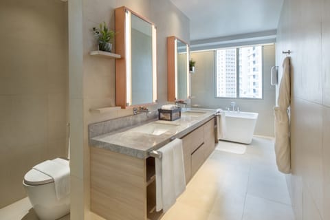 Suite | Bathroom | Separate tub and shower, rainfall showerhead, hair dryer, bathrobes