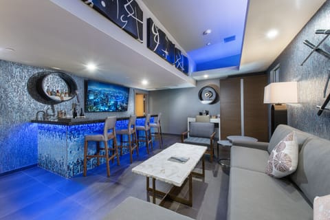 Penthouse Luxury Suite | Living area | 37-inch flat-screen TV with cable channels, TV