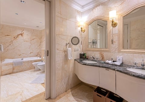Suite, Non Smoking (Willingdon Crescent) | Bathroom | Shower, designer toiletries, hair dryer, bathrobes