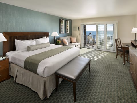 King Bed Partial Ocean and Pool View | In-room safe, desk, blackout drapes, iron/ironing board