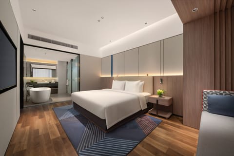 1 King Bed 1 Bdrm Suite With Bath | Premium bedding, down comforters, laptop workspace, blackout drapes