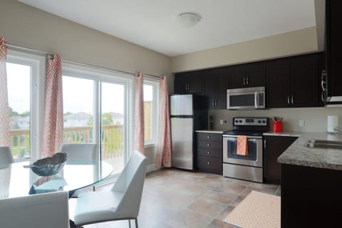 Three-Bedroom Upper Townhome-99 | Private kitchen | Coffee/tea maker, electric kettle