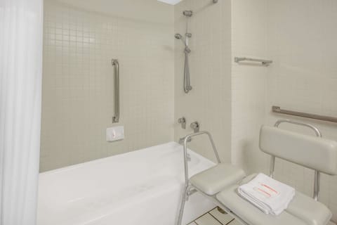 Room, Accessible, Refrigerator | Bathroom | Combined shower/tub, eco-friendly toiletries, hair dryer, towels