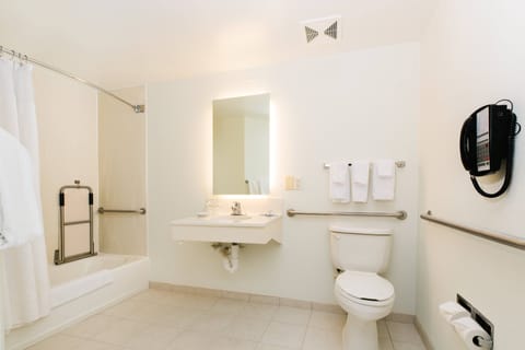 Suite, 1 King Bed with Sofa bed | Bathroom | Combined shower/tub, hydromassage showerhead, free toiletries