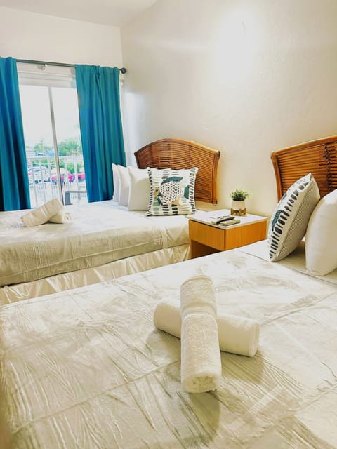 Standard room, 2 double beds with balcony | Iron/ironing board, free WiFi, bed sheets