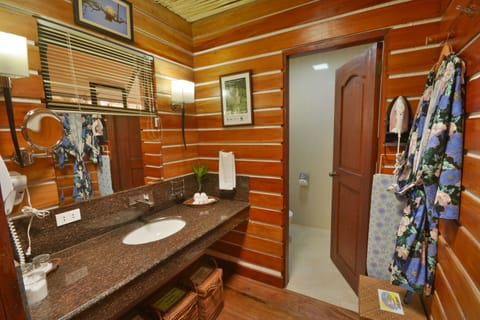 Suite, Beachfront (Daluyon) | Bathroom | Shower, free toiletries, hair dryer, bathrobes