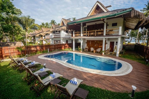 Suite, Beachfront (Daluyon) | Outdoor pool | 2 outdoor pools