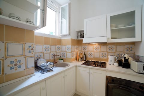 Superior Apartment | Private kitchen | Fridge, electric kettle, cookware/dishes/utensils, dining tables