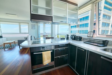 Apartment | Private kitchen | Full-size fridge, microwave, oven, cookware/dishes/utensils