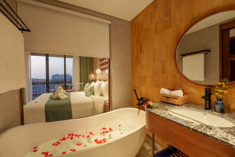Family Connecting Room, 2 bed room | Bathroom | Rainfall showerhead, designer toiletries, hair dryer, bathrobes
