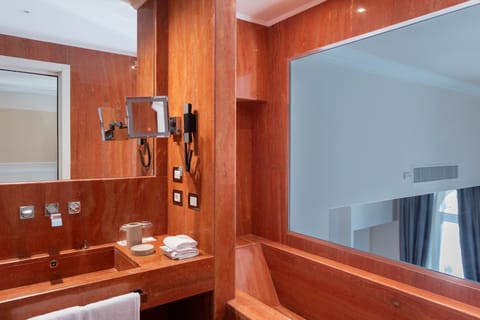 Suite | Bathroom | Designer toiletries, hair dryer, bathrobes, slippers