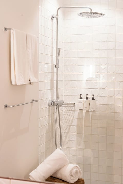 The Parlor Suite | Bathroom | Shower, rainfall showerhead, free toiletries, hair dryer