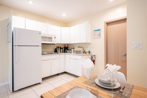 Honeymoon Studio | Private kitchen | Full-size fridge, microwave, stovetop, coffee/tea maker