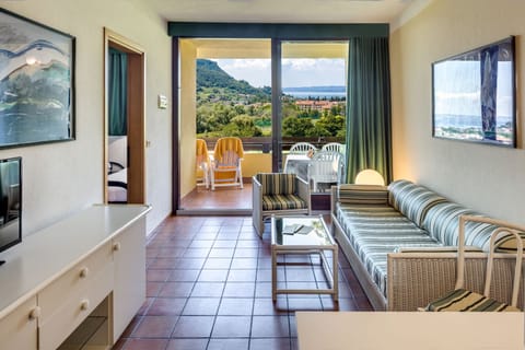 Apartment, 1 Bedroom, Terrace | Down comforters, minibar, in-room safe, individually furnished