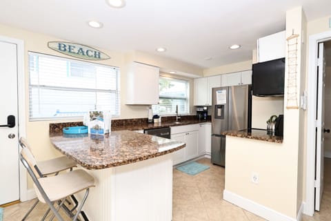 The Haven, 1 King Bedroom 1 Bath | Private kitchen | Full-size fridge, microwave, oven, stovetop