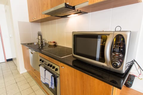 Studio Apartment with Kitchen | Private kitchen | Microwave, stovetop, dishwasher, coffee/tea maker