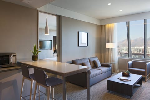 Suite, 1 Bedroom, City View | Living area | 42-inch LCD TV with cable channels, TV, iPod dock