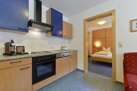 Apartment (Top 1) | Private kitchen | Fridge, stovetop, coffee/tea maker, electric kettle