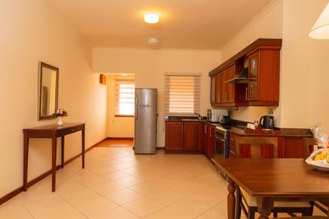 Two Bedroom Apartment | Private kitchen | Coffee/tea maker, electric kettle, cleaning supplies