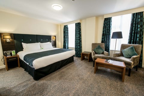 Suite, 1 King Bed | In-room safe, iron/ironing board, rollaway beds, free WiFi