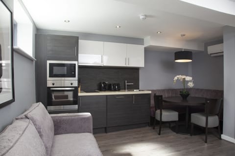 Two Bedroom Luxe (Sleeps 6) | Private kitchen | Full-size fridge, microwave, oven, stovetop