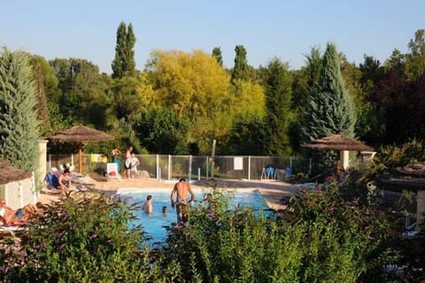 Outdoor pool, open 9:00 AM to 8:00 PM, pool umbrellas, sun loungers