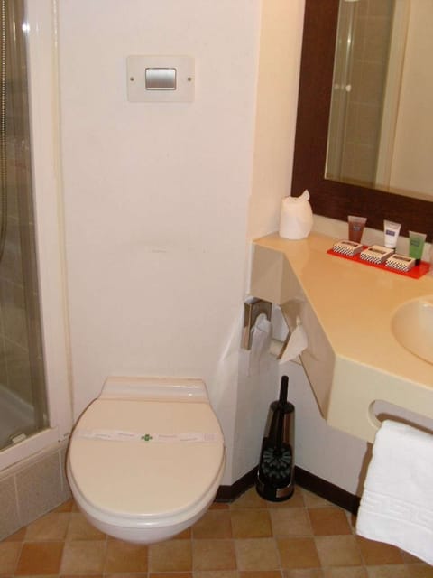Standard Room, Multiple Beds | Bathroom | Shower, eco-friendly toiletries, hair dryer, towels