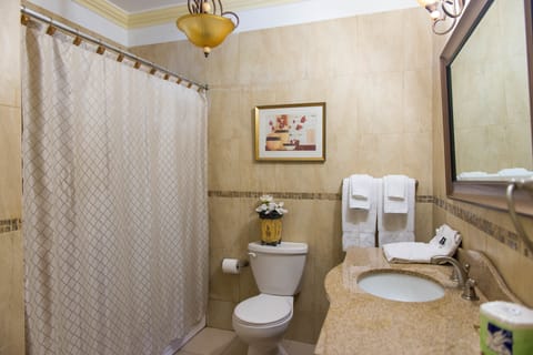 Suite, 2 Bedrooms, Balcony | Bathroom | Free toiletries, bathrobes, towels, shampoo