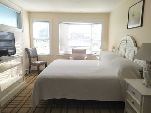 Standard Triple Room, Private Bathroom, Partial Sea View (Room 112) | Down comforters, individually decorated, individually furnished