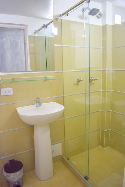 Triple Room, Private Bathroom | Bathroom | Shower, hair dryer, towels, soap