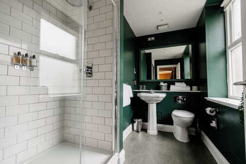 Suite | Bathroom | Shower, designer toiletries, hair dryer, slippers