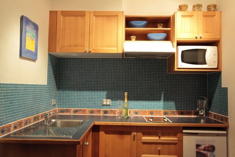 Standard Apartment, 2 Bedrooms | Private kitchenette | Fridge, microwave, stovetop, coffee/tea maker