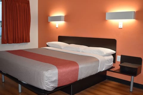 Deluxe Room, 1 King Bed, Non Smoking, Refrigerator & Microwave | Desk, free WiFi, bed sheets