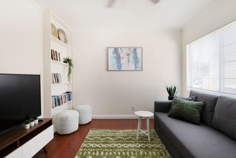 Kick back and relax in our well-furnished and tastefully decorated living room, where comfort meets style.