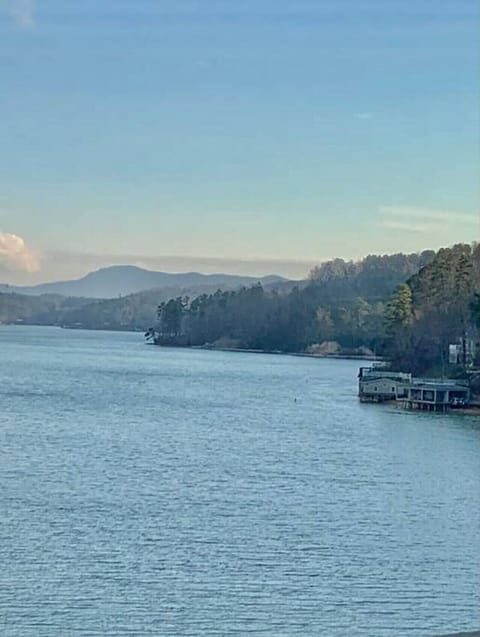 Amazing views of Lake Lure and the surrounding mountains from the upper level lakefront balcony off the family room.