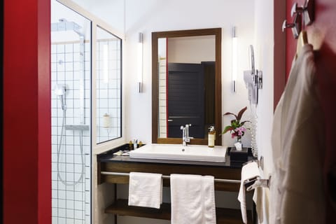 Privilege, Suite, 1 King Bed | Bathroom | Shower, rainfall showerhead, eco-friendly toiletries, hair dryer