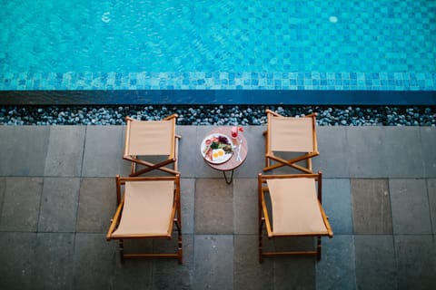 Outdoor pool, pool umbrellas, sun loungers