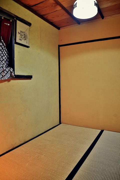 Japanese-Style Single Room, Shared Bathroom | Down comforters, in-room safe, blackout drapes, iron/ironing board