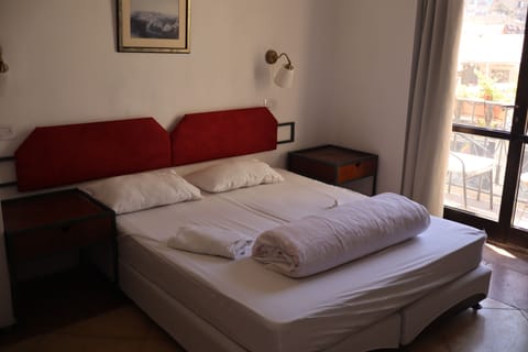 Comfort Quadruple Room | In-room safe, free WiFi, bed sheets