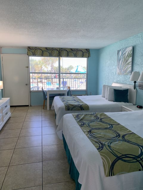 Room, 2 Queen Beds, Balcony, Ocean View | Iron/ironing board, free WiFi, bed sheets