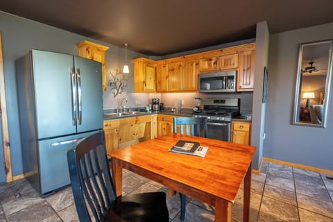 Beaver Lake Cabins | Private kitchen | Full-size fridge, microwave, oven, stovetop