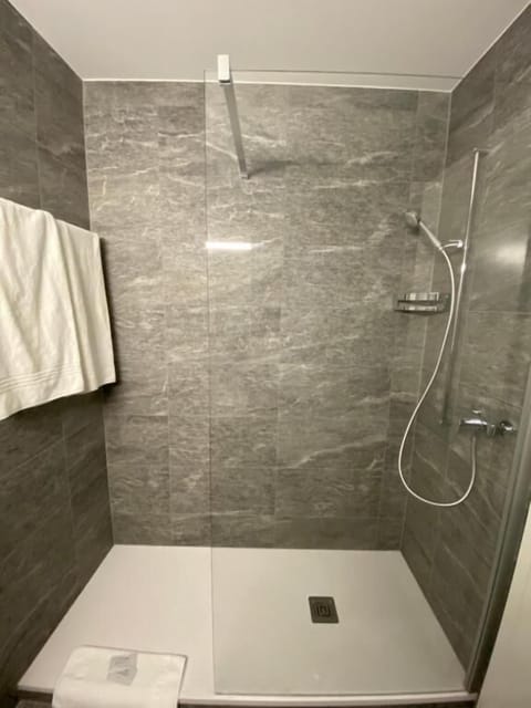 Double Room | Bathroom | Shower, hair dryer, towels