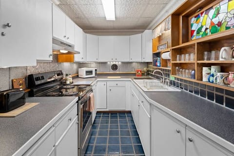 Cook up with our spacious countertop and top-notch appliances