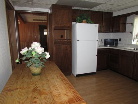 Microwave, coffee/tea maker, toaster, cookware/dishes/utensils