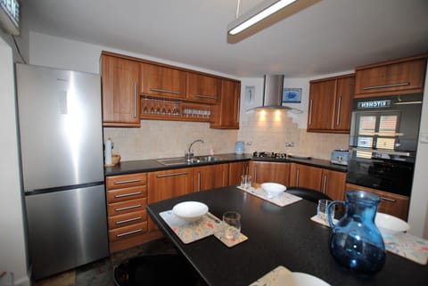 The kitchen has plenty space to cook together