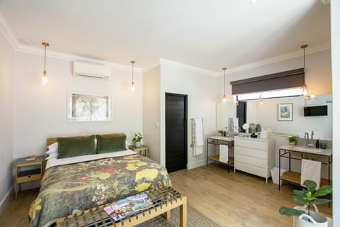 Luxury Room, Garden Area | Minibar, in-room safe, individually decorated, free WiFi