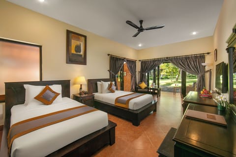 Senior Bungalow, Garden View | Premium bedding, minibar, in-room safe, desk