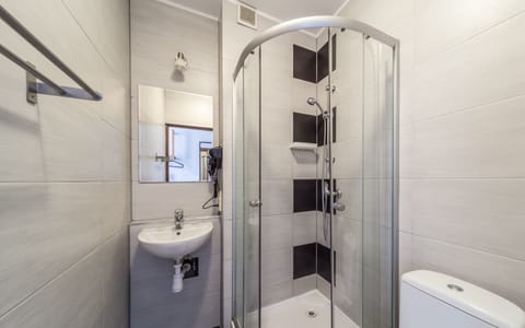 Economy Double or Twin Room, Refrigerator | Bathroom | Shower, rainfall showerhead, hair dryer, towels